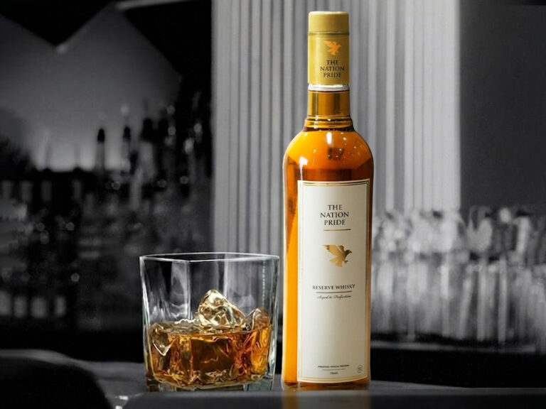 Elegant presentation of The Nation Pride Whisky in a luxury bar setting